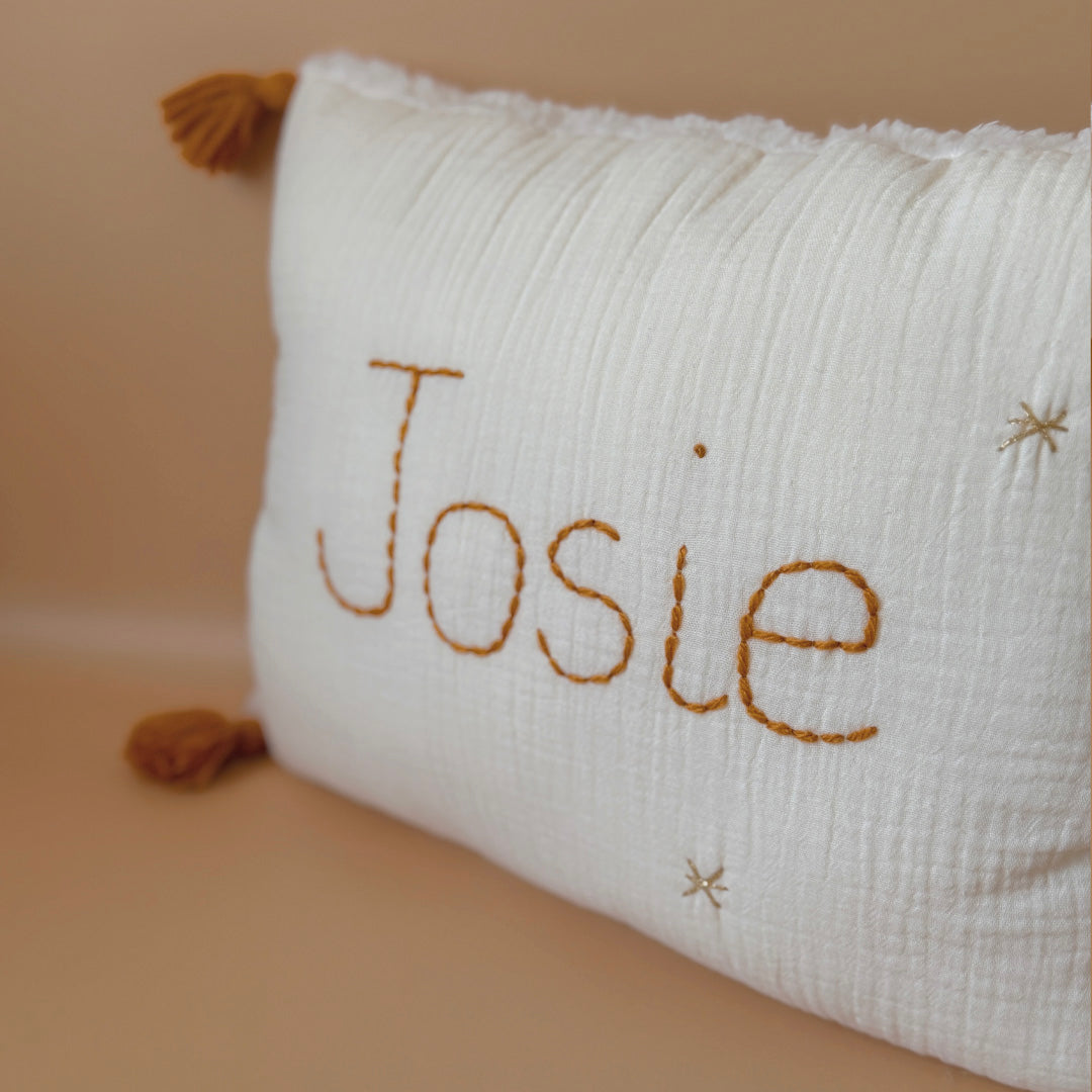 Coussin personnalisé - coloris de pompons au choix