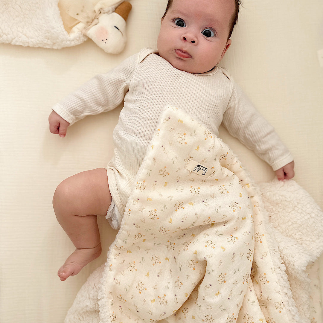 couverture sherpa et motif gaze de coton