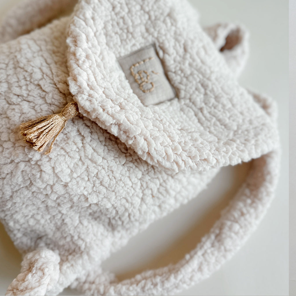 sac a dos bébé en moumoute beige