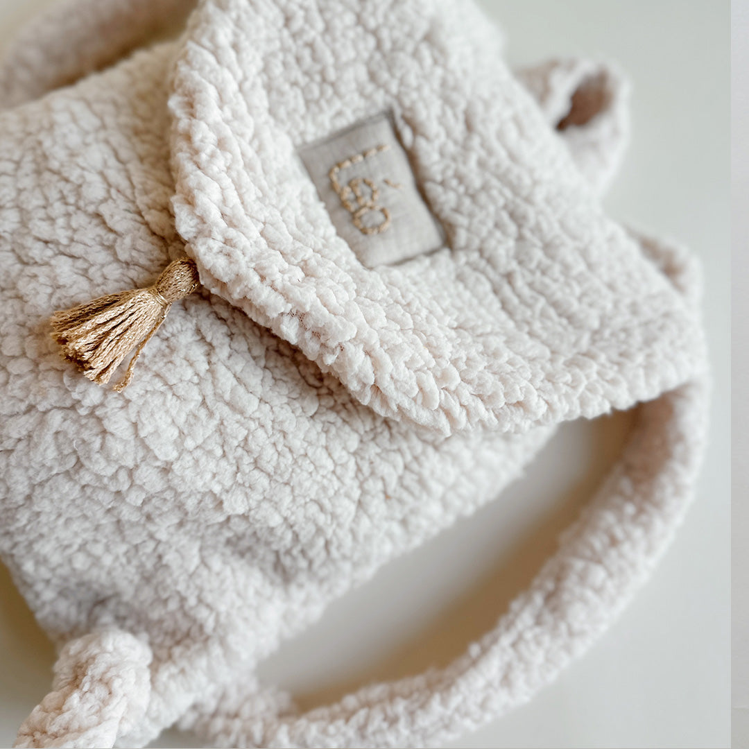 sac a dos bébé en moumoute beige