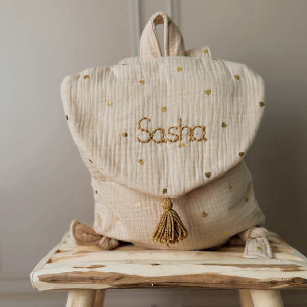 sac a dos motifs coeurs dorés 16